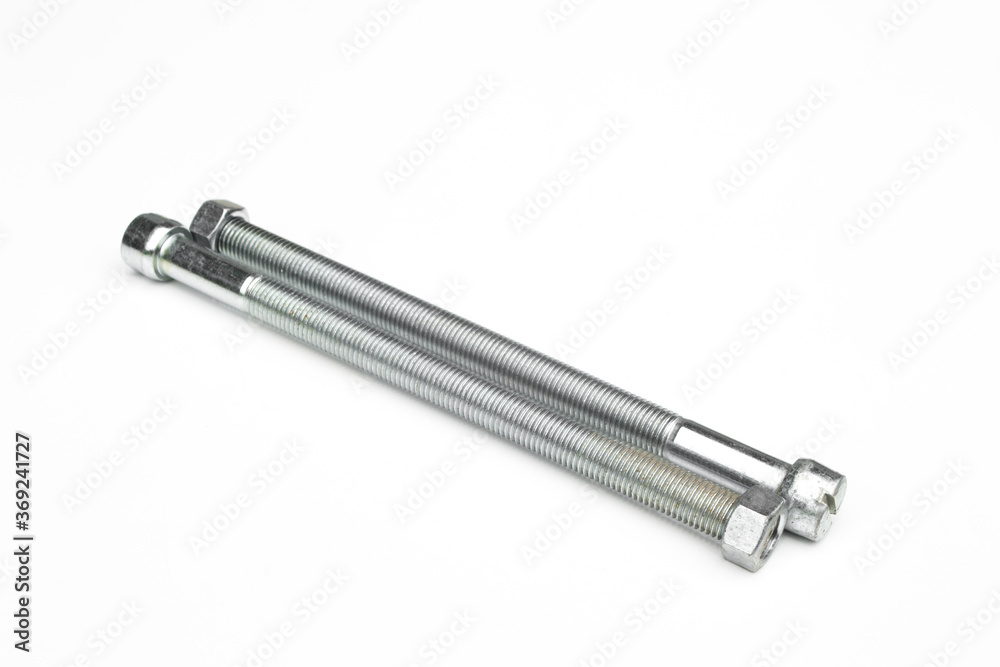 Stainless steel bolt and nut isolated on white background. Stainless steel bolt and nut isolated on white background.
