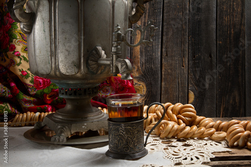 Russian traditional tea-drinking: a samovar, drying and tea in cup holder