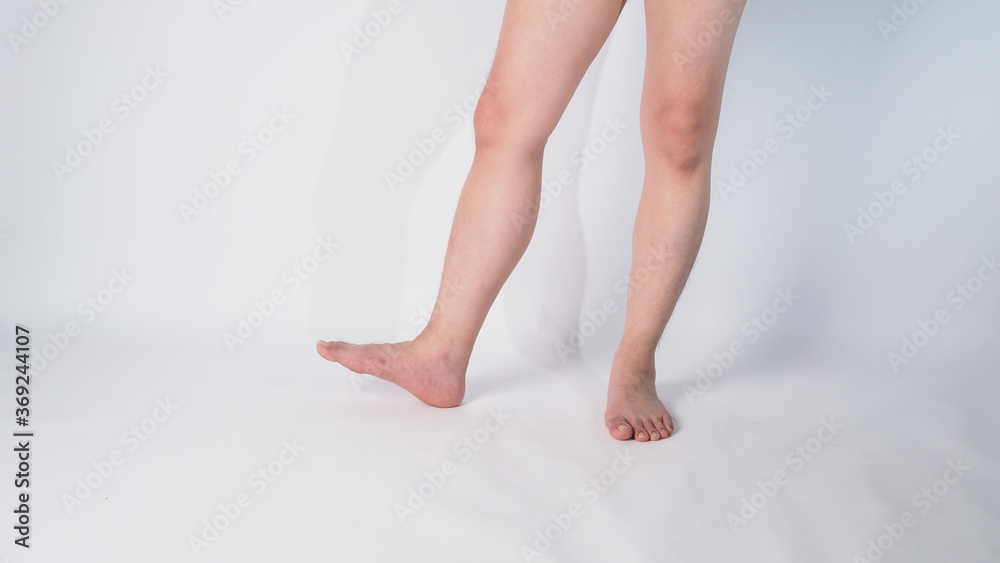 Asian Male barefoot is isolated on white background. Asian Male barefoot is isolated on white background.