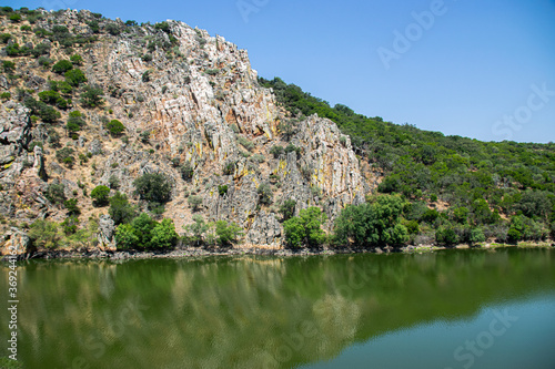 Photo of the impressive and beautiful national park of Monfrag  e  pure nature with rocks  lakes and no people. Outdoor environment located in C  ceres  Extremadura  Spain.