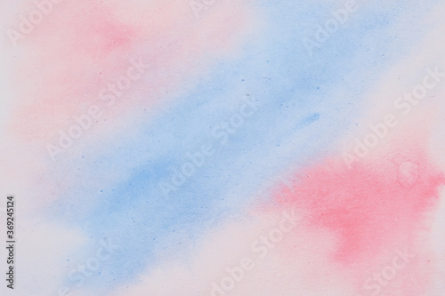 Abstract pink-blue watercolor painted background.