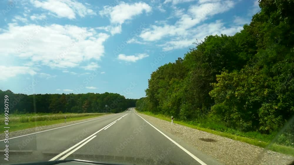 Point of view of vehicle driving on empty road. Point of view of vehicle driving on empty road.