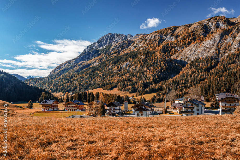 Awesome alpine highlands in sunny day. Wonderful autumn landscape, cenic image of fairy-tale woodland in sunlit. picture of wild area. Dolomites alps. Italy Awesome alpine highlands in sunny day. Wonderful autumn landscape, cenic image of fairy-tale woodland in sunlit. picture of wild area. Dolomites alps. Italy