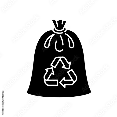 Compostable trash bag black glyph icon. Waste recycling silhouette symbol on white space. Refusing from plastic litter bags. Eco friendly, biodegradable materials use vector isolated illustration