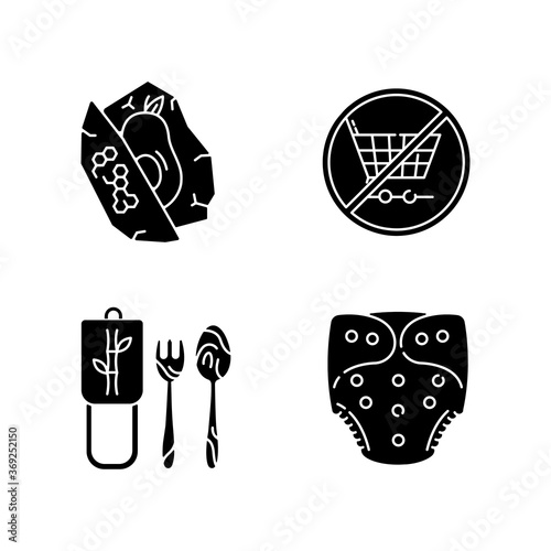 Anti consumerist lifestyle black glyph icons set on white space. Beeswax food wrap, bamboo cutlery and cloth diaper silhouette symbols. Biodegradable materials use. Vector isolated illustrations