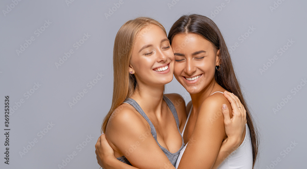 Portrait of two cheerful young women Portrait of two cheerful young women