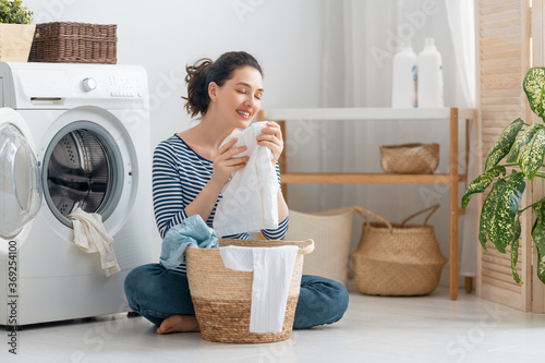 woman is doing laundry photo