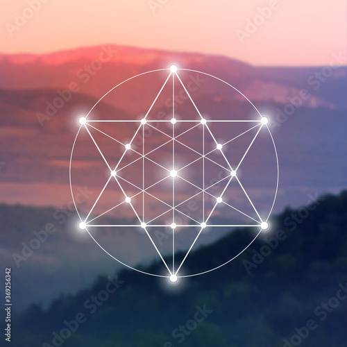 Merkaba sacred geometry spiritual new age futuristic illustration with interlocking circles, triangles and glowing particles in front of blurry natural photographic background