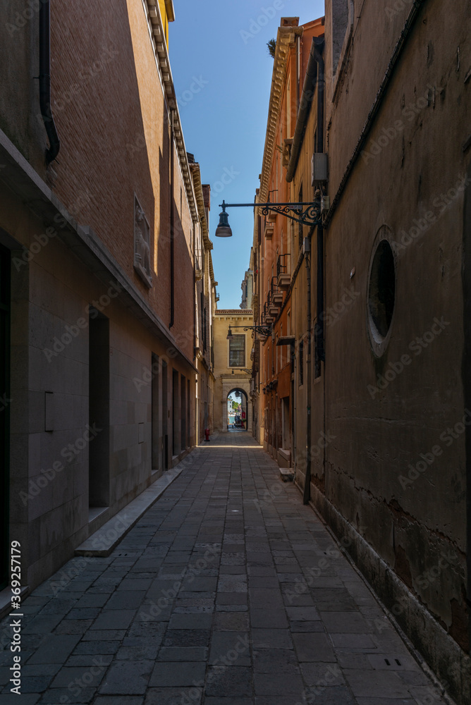 The light and shadows in the empty narrow alleys of Venice  during the coronavirus