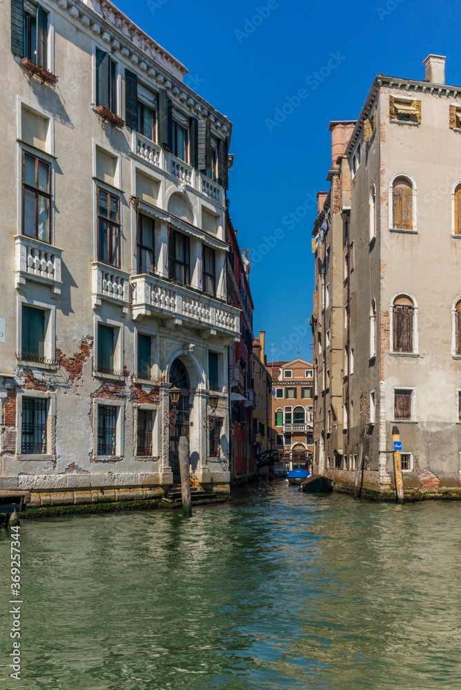The entrances on the water channels of the old palaces in Venice, as seen from a gondola The entrances on the water channels of the old palaces in Venice, as seen from a gondola