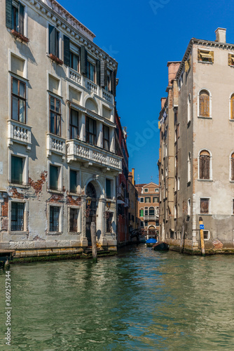 The entrances on the water channels of the old palaces in Venice, as seen from a gondola