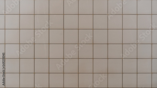 decor of white plastic tiles on corporate building wall