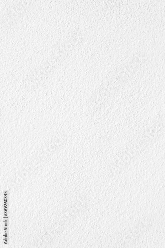 Vertical image of white cement or concrete wall texture for background, Empty space.