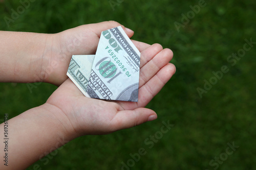 image of money hand grass background 