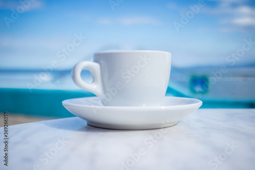 Cup of coffee at Swimming pool outdoors