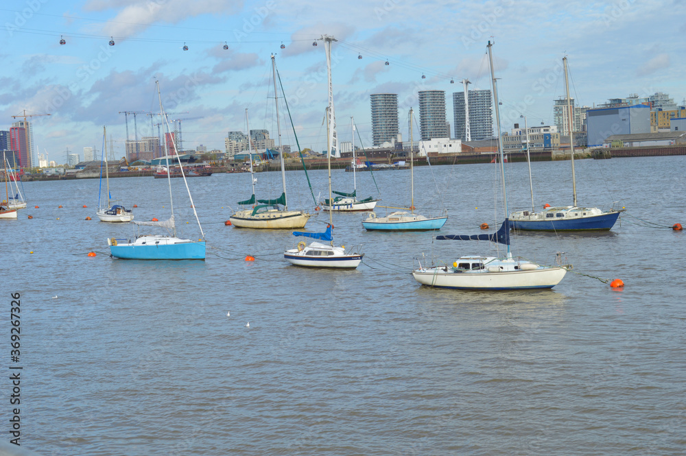 Boats moored on the thames