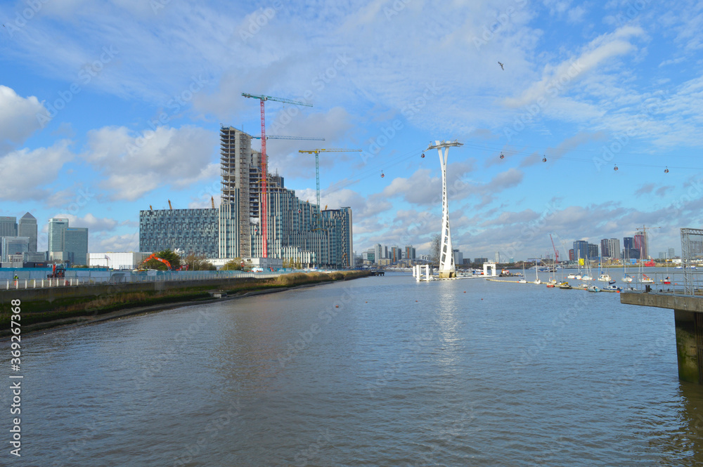 London skyline with emirates skylink against the blue sky