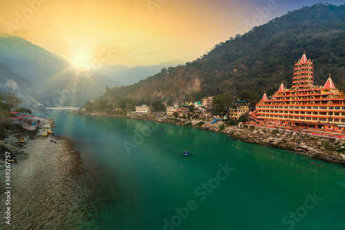 View of Ganga river embankment, Lakshman Jhula bridge and Tera Manzil Temple, Trimbakeshwar in Rishikesh