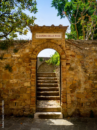 Rose garden entrance in San quirico d'orcia Tuscany Italy