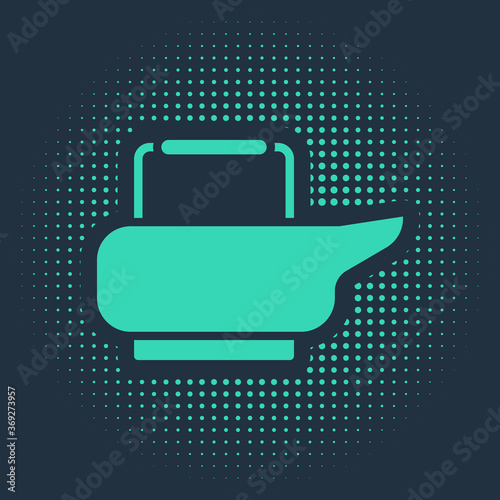 Green Bedpan icon isolated on blue background. Toilet for bedridden patients. Abstract circle random dots. Vector Illustration.