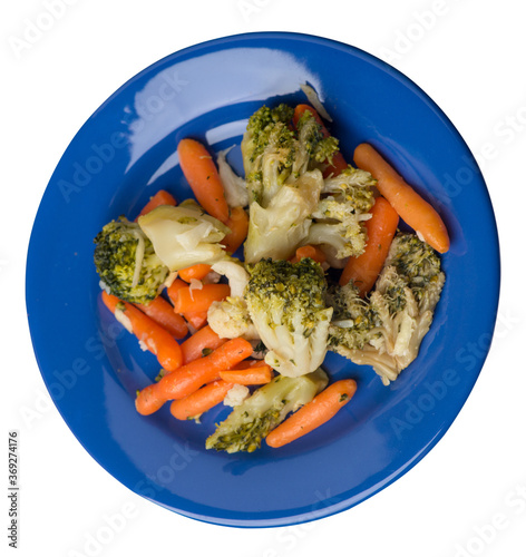 provencal vegetables on a plate.grilled vegetables on a plate isolated on white background.broccoli and carrots on a plate top view.healthy food