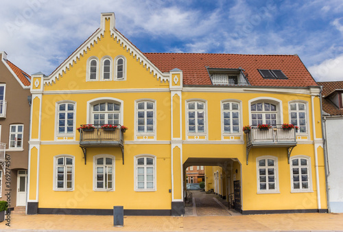 Old yellow house in the historic harbor of Sonderborg, Denmark