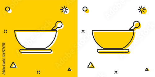 Black Mortar and pestle icon isolated on yellow and white background. Random dynamic shapes. Vector Illustration.