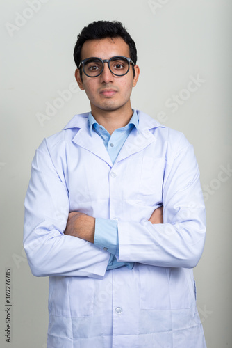 Portrait of young handsome Indian man doctor © Ranta Images