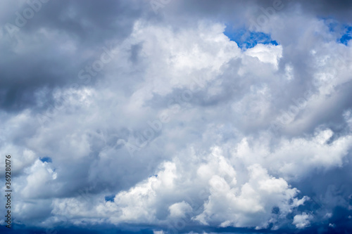 beautiful fluffy clouds in the blue sky