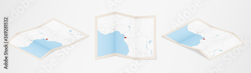 Folded map of Equatorial Guinea in three different versions.