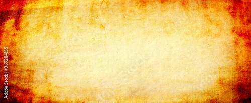 Gold background with vintage texture, yellow background with brown border, old yellow paper or parchment.