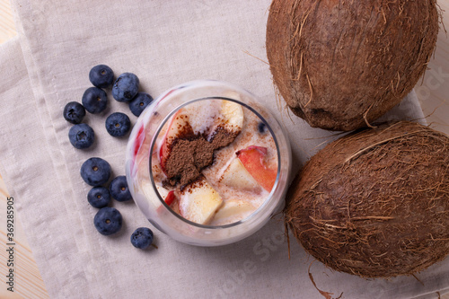 yumy milky desert or yughurt with fruit and berries photo