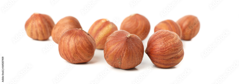 Tasty hazelnuts isolated on white background. Vitamin food