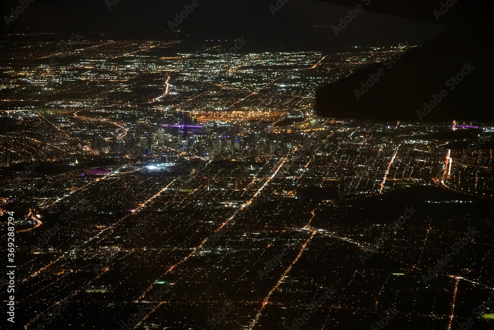 Melbourne, Australia. Aerial view of city skyline at night from the airplane