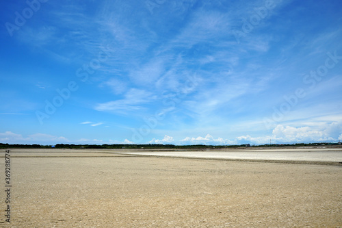 saline field with beautiful blue sky in Thailand.