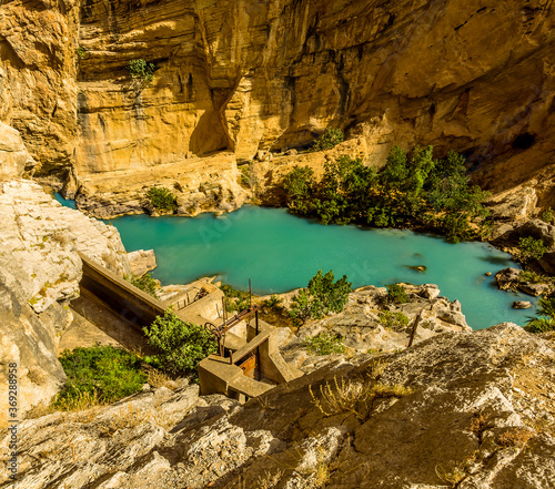 A view looking down to the Gaitanejo river from the Caminito del Rey pathway near Ardales, Spain in the summertime