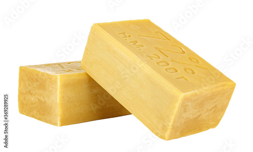 Lying two pieces of laundry soap isolated on white background