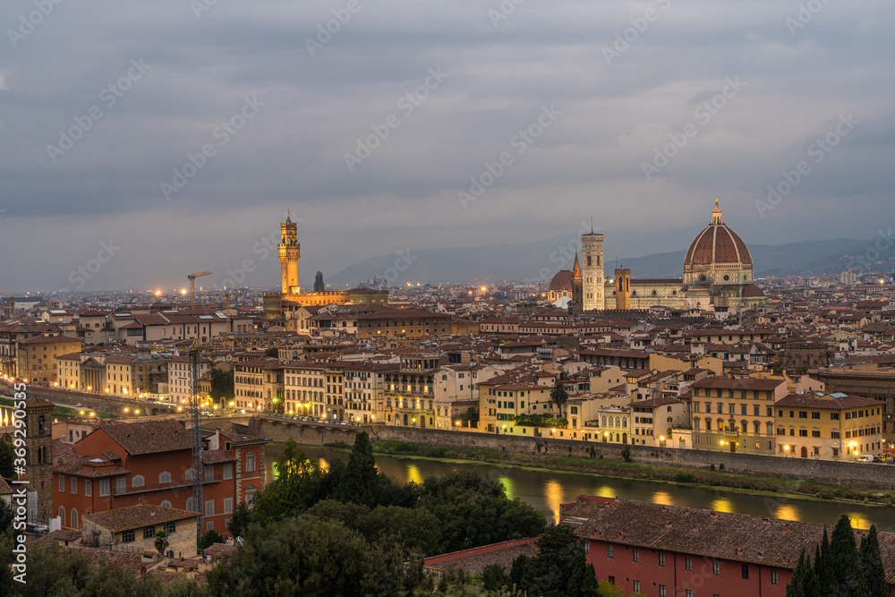 Florence old city skyline at night with Cathedral of Santa Maria del Fiore in Florence, Tuscany, Italy.
