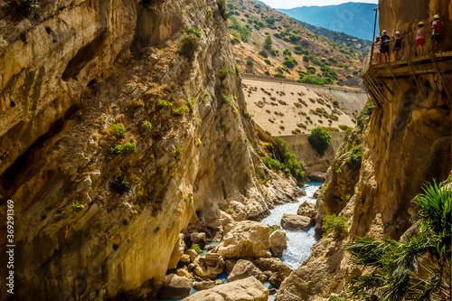 A view of the Caminito del Rey pathway suspended above the Gaitanejo river near Ardales, Spain in the summertime