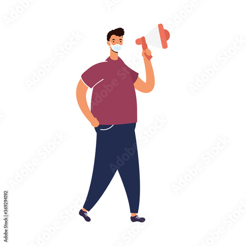 man wearing medical mask protesting with megaphone