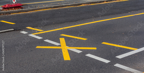 Yellow road markings in a construction site urban asphalt attention confusing road construction renovation wear and tear accident infrastructure fiber optic