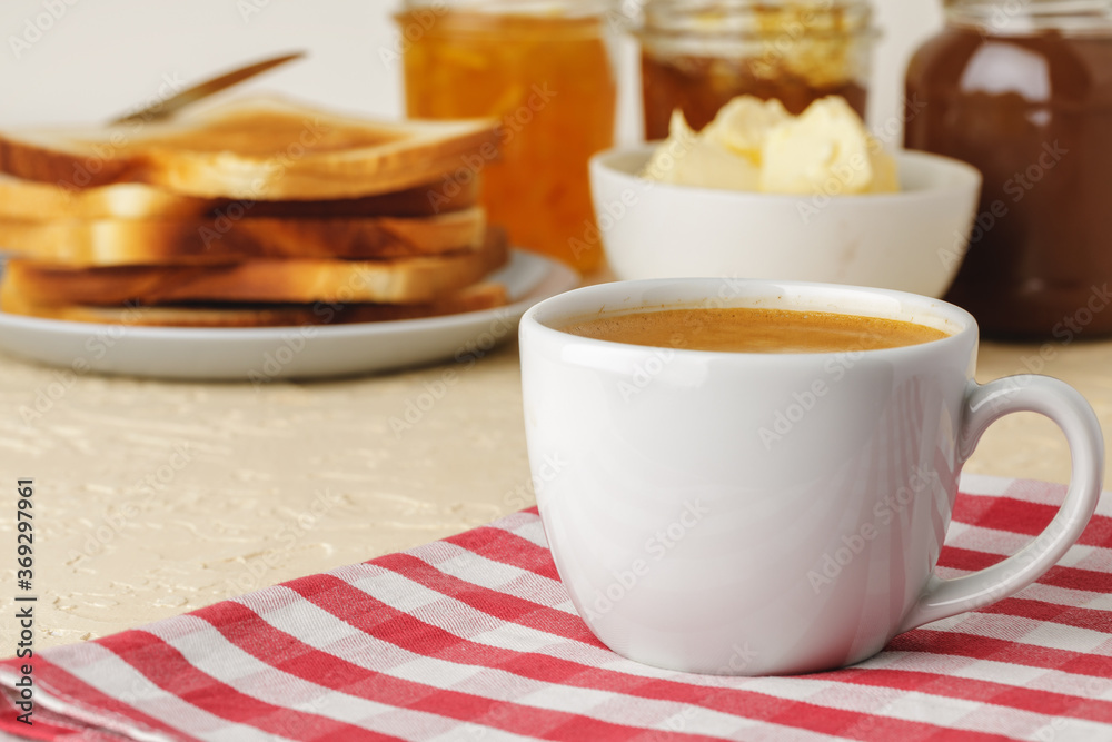 White porcelain cup with fresh coffee close up White porcelain cup with fresh coffee close up