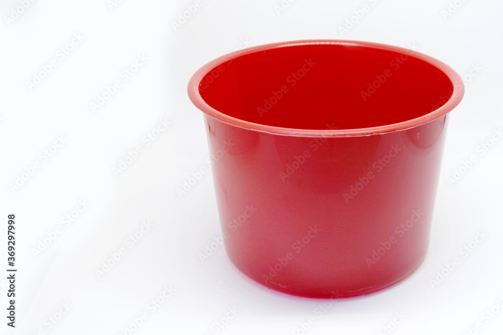 A red plastic pot for utilities, without logo A red plastic pot for utilities, without logo