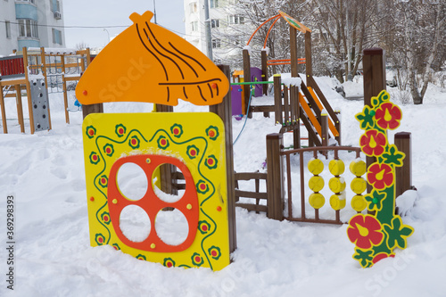 Dormitory area with playround in winter photo