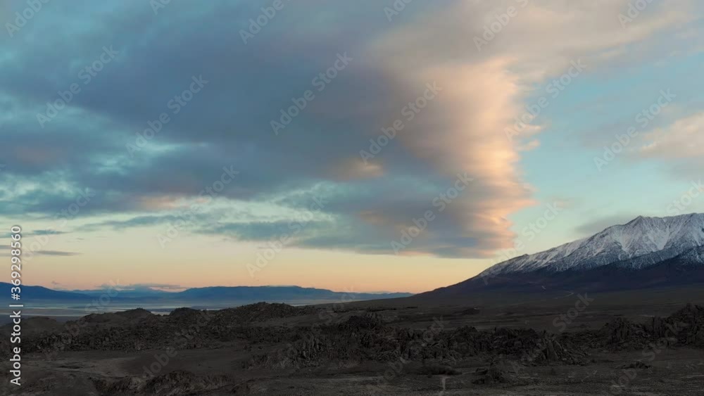 Cinematic aerial flyover of rugged rock formation at Alabama Hills in Eastern Sierra in California Cinematic aerial flyover of rugged rock formation at Alabama Hills in Eastern Sierra in California