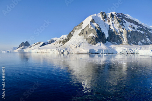 Antarctic landscape, glacier and mountain, with reflection in water, Antarctica © HWL Photos