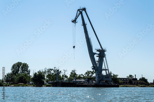 Ship crane on Sulina branch. The Danube Delta, the second largest river delta in Europe. Romania.