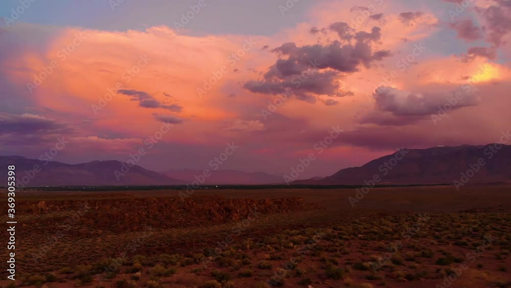 Cinematic aerial shot of sunset sky over Volcanic Tableland in Eastern Sierra, California Cinematic aerial shot of sunset sky over Volcanic Tableland in Eastern Sierra, California