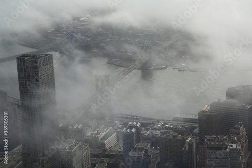 Photography Famous Aerial view of the Brooklyn Bridge in New York City, USA with beautiful cloudy sky and Manhattan skyline, America
