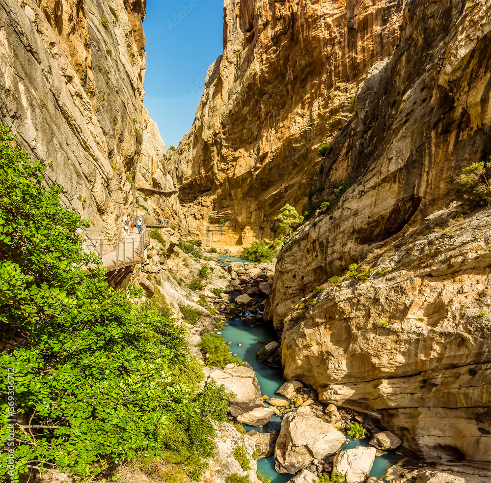 A view of the gorge of the Gaitanejo river  and the Caminito del Rey pathway following its course near Ardales, Spain in the summertime